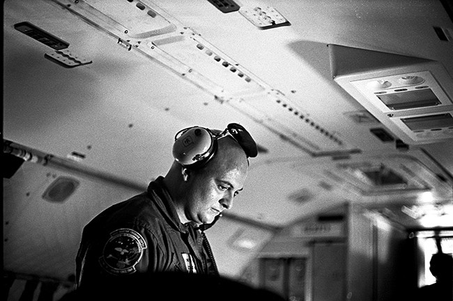 Coast Guard air crew on board aircraft flying over the spill site. 